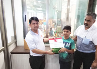 Kid getting certificate of appreciation